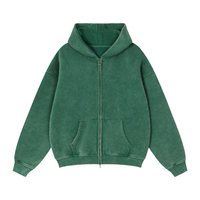 Load image into Gallery viewer, A dark green hoodie with double zipper in a vintage wash.
