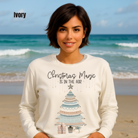 Load image into Gallery viewer, Close-up of Christmas Magic Is In The Air graphic on Comfort Colors 6014 long sleeve ivory shirt