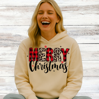 Load image into Gallery viewer, “Woman wearing Merry Christmas vintage wash hoodie on the beach – Salty Cotton”