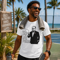 Load image into Gallery viewer, Smiling Black man wearing white Lob Father pickleball shirt standing beside a pickleball court after a match with paddle and towel.