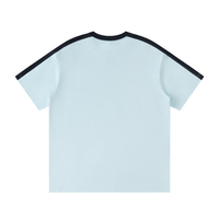 Load image into Gallery viewer, Light blue t-shirt with black trim on a white background