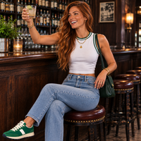 Load image into Gallery viewer, Green preppy athletic crop tank styled with light wash jeans and retro sneakers