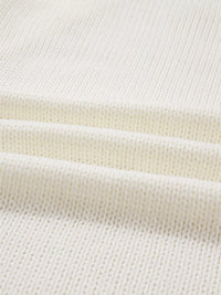 Load image into Gallery viewer, A closer look at the knitted material of the ivory sweater.