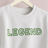 Load image into Gallery viewer, Close-up of green LEGEND embroidery on white Salty Cotton crewneck sweatshirt